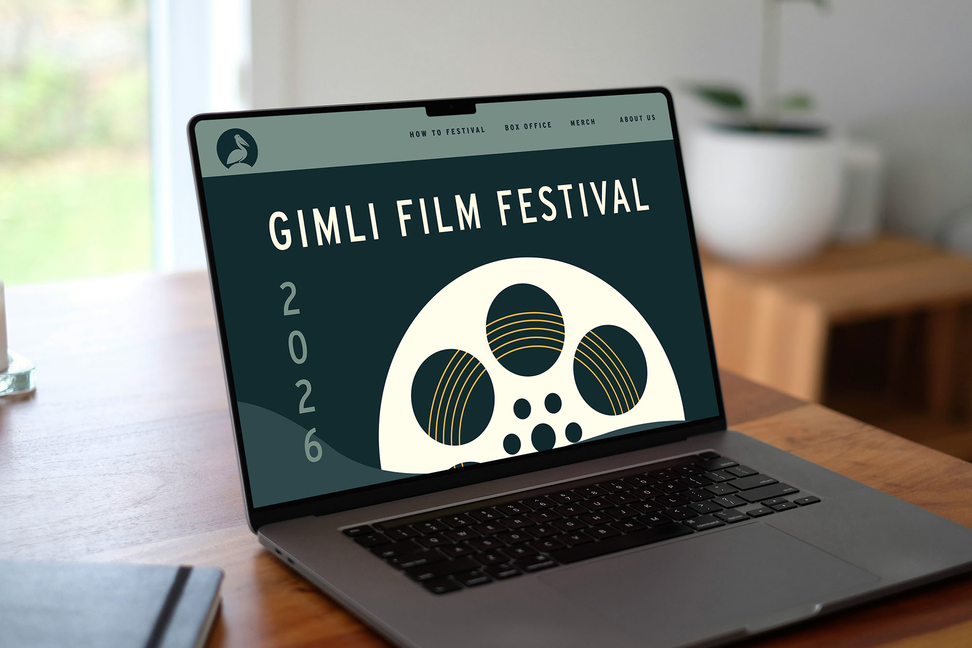 website homepage on a laptop for gimli film fest